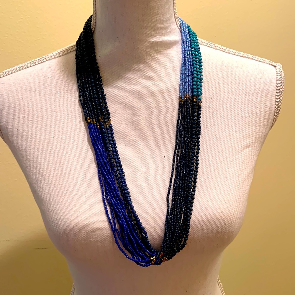 Multi strand beaded necklace in shades of blue